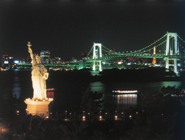Rainbow Bridge and the Statue of Liberty in Odaiba at Night